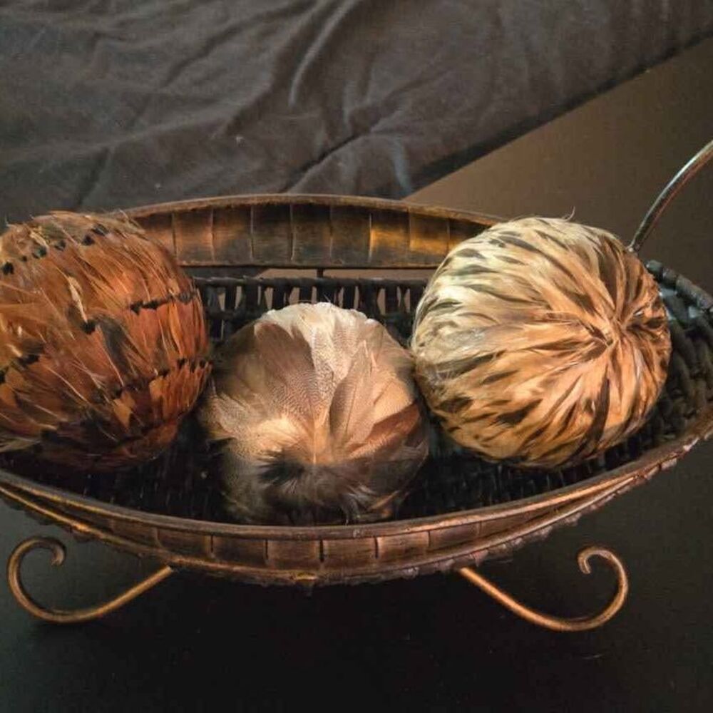 Home Decor Feathered Spheres in a Beautiful Oval shaped Metal & Wicker Basket.